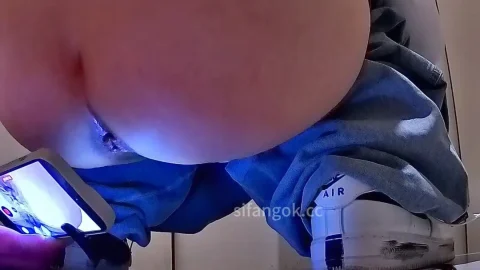 Asian Man Exposes Buttocks in Medical Facility