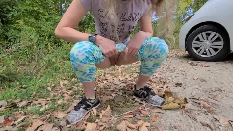Blonde in forest exposes herself on dirt road near car