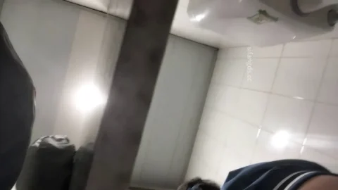 Asian Woman Exposing Buttocks in Bathroom
