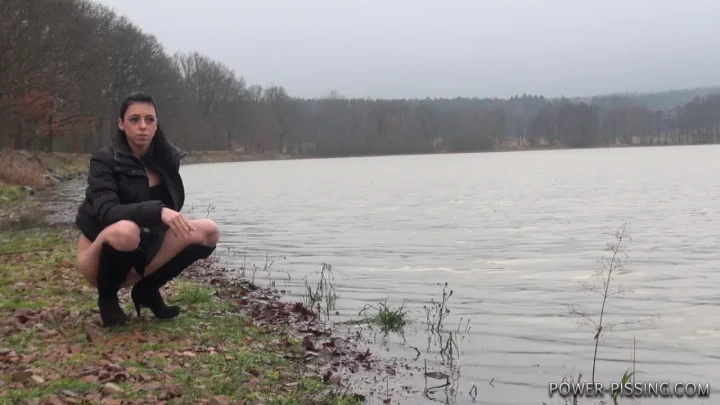 Annie on the Shore – Outdoor Peeing Scene by the Lake