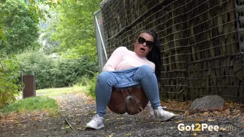 Bursts In Public – Dark-Haired Milf Squats Outdoors