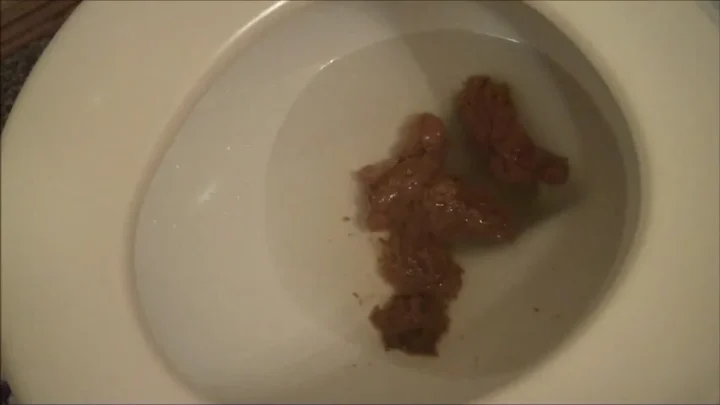 Slim girl squats and sits on toilet, pooping and straddling in dim bat