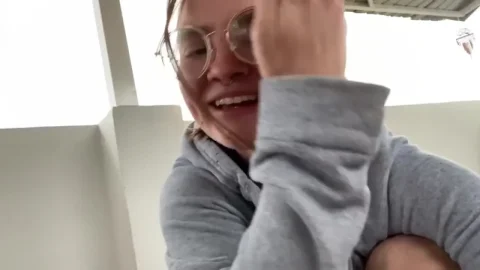 Blonde with glasses spreads in bathroom, shows off in selfie shots
