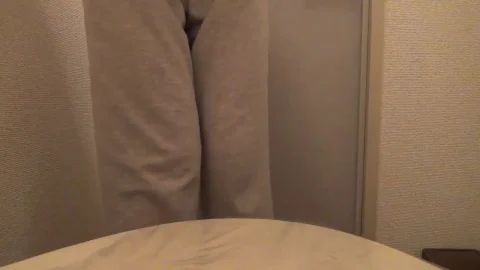 Close-up POV of woman defecating in bathroom
