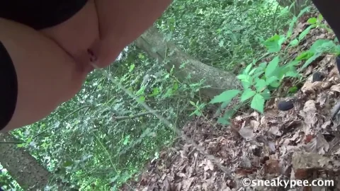 Slim brunette spreads in forest POV shot with tattoo on thigh