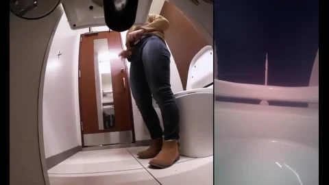 Asian Woman in Black Boots and White Shirt Gets Intimate in Bathroom