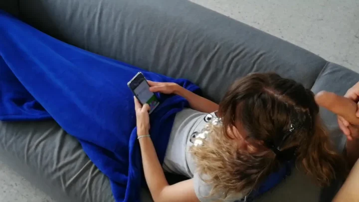 Two blondes fuck on couch, one with arm tattoo