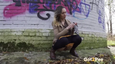 In The Nick Of Time – Blonde Outdoor Squatting Scene
