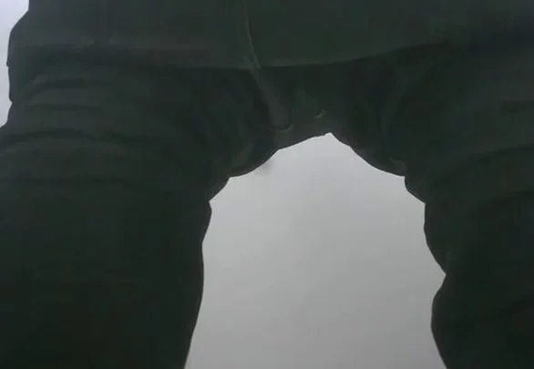 Asian guy bends over in bathroom showing off slim ass