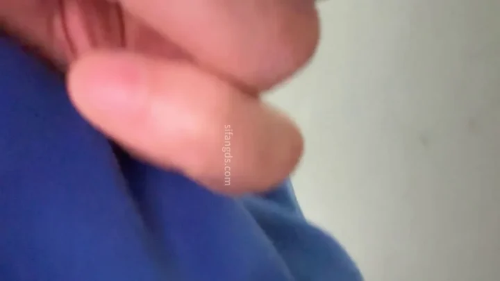 A loser guy accidentally showed his face in the photo
