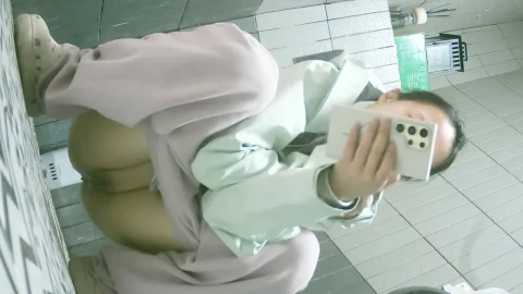 Pretty Girl in Long Boots Changing Sanitary Napkins